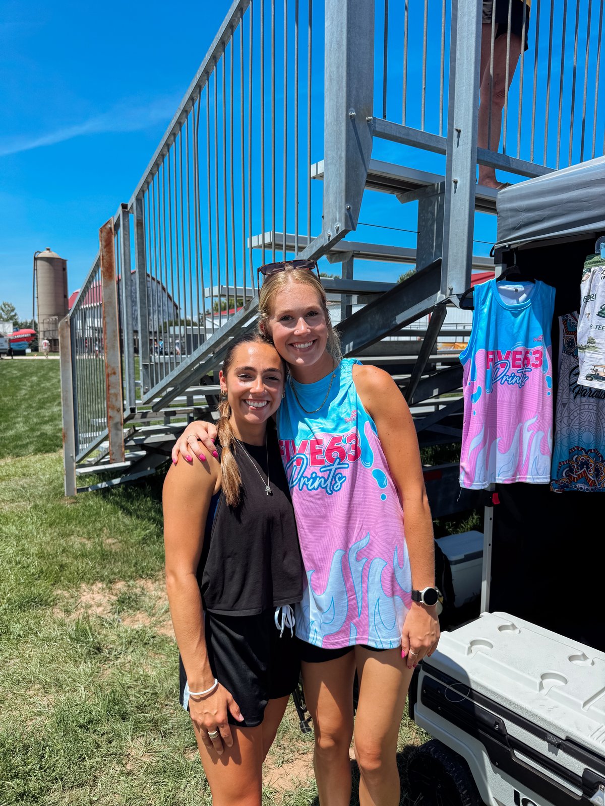 Friends wearing a FIVE63 Prints custom jersey at a tournament