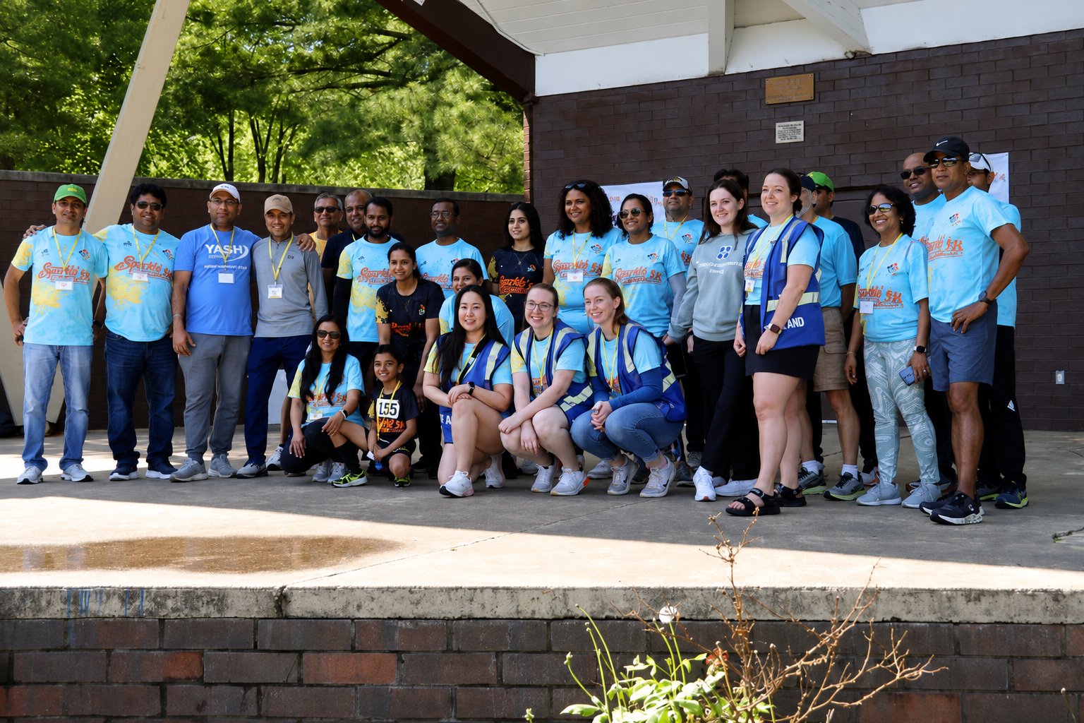 Sparkle 5K event group wearing custom race t-shirts