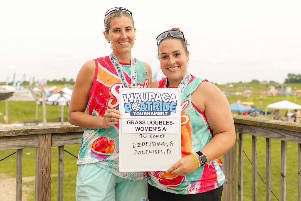 Tournament winning team wearing custom Swirl jerseys with medals